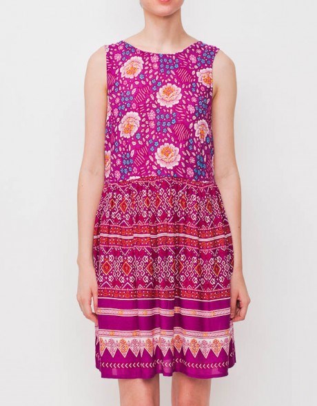 A brightly patterned little dress you'll want to wear all summer long. Features a keyhole closure at back, and a gently pleated skirt. By Mink Pink.