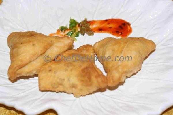 A famous authentic Indian snack, Samosas are prepared and liked in almost all parts of world these days. They're a lovely snack for a rainy cold day... We share with you step by step recipe to make de