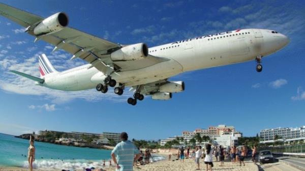 Maho Beach is located in St Maarten, and famous for the Princess Juliana International Airport adjacent to the it. Arriving aircraft must touch down as close as possible to the beginning of Runway 10 