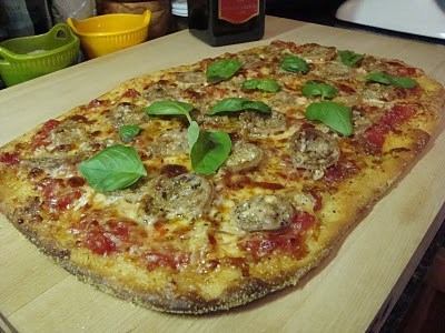 Thin Crust Pizza with Italian Sausage and Fresh Garlic